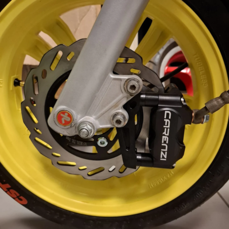 Patte de déport pour étrier de frein 4 pistons adaptable Yamaha Aerox Jog MBK Nitro Mach G